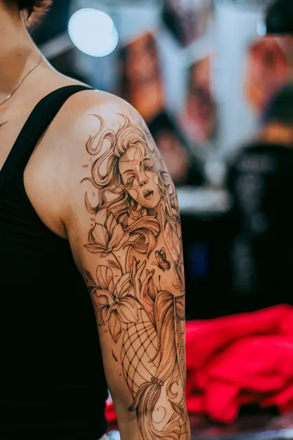 Illustrative portrait half sleeve with flowers, fresh